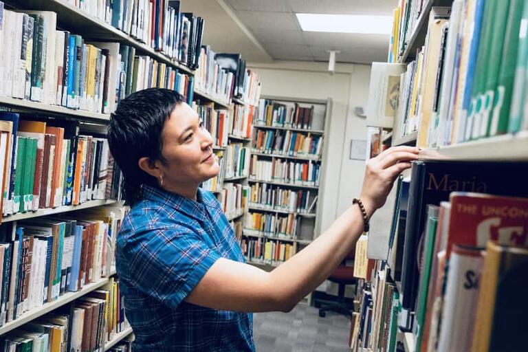 Photograph of Sine Hwang-Jensen in the Ethnic Studies Library.