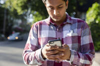 Student on Mobile Device 