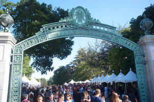 Cal Day attendants and tents near Sather Gate